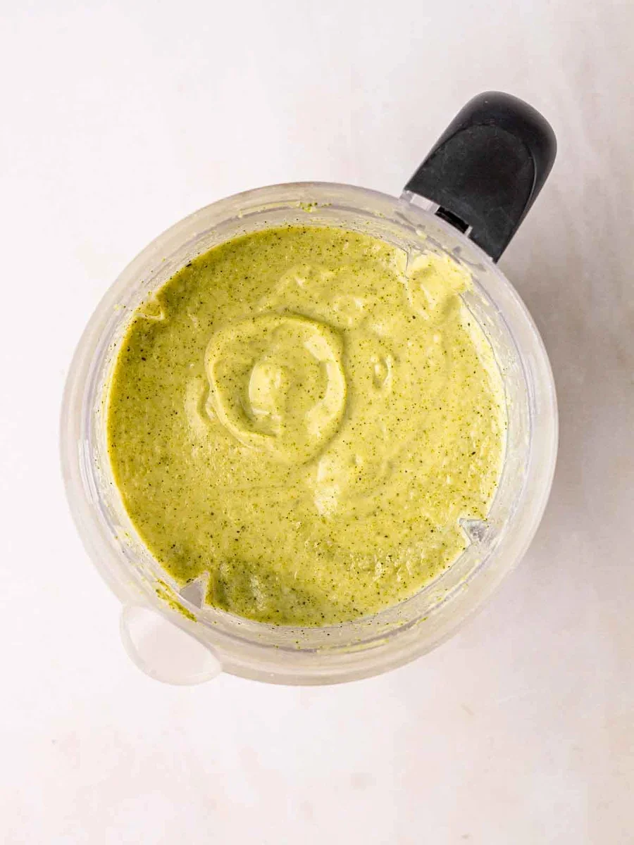 Blending broccoli and stilton soup to creamy consistency