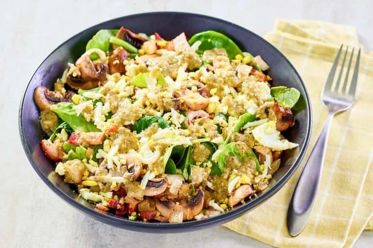 17 Spring Brunch Salads That Feel Fresh 4 finished Chart House spinach salad with bacon, eggs, and warm dressing
