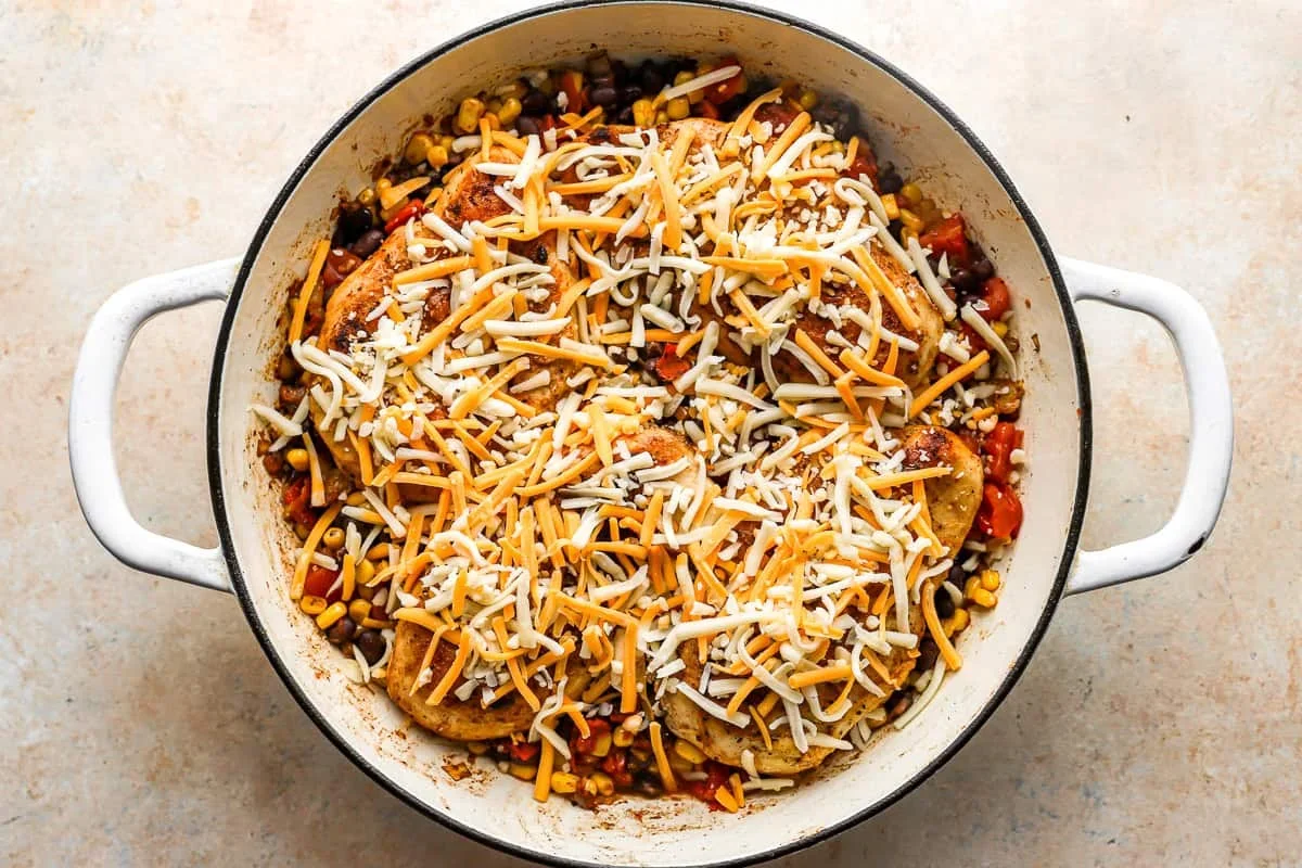 chicken and veggies topped with shredded mexican cheese blend