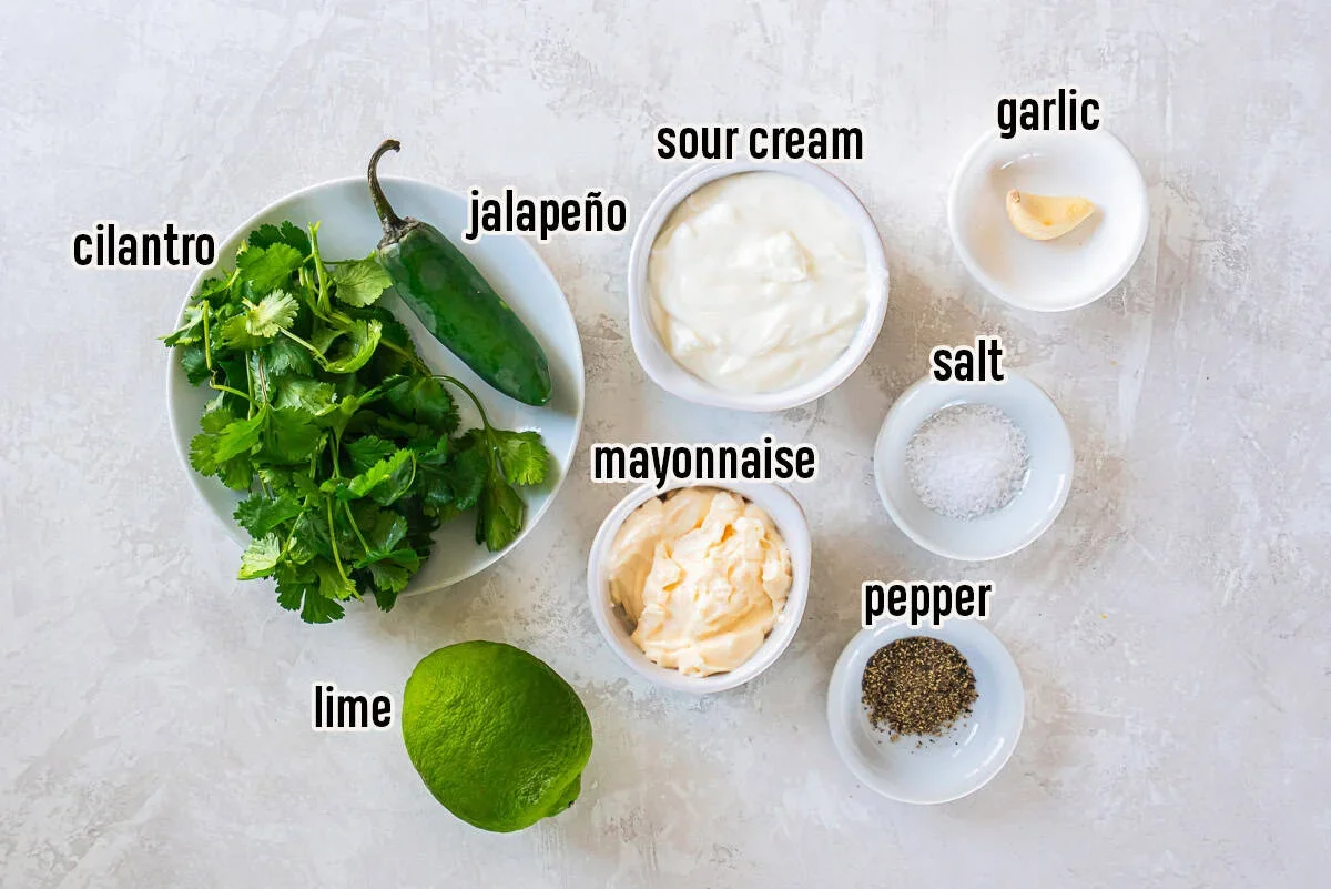 fresh cilantro, lime, jalapeno and other ingredients for creamy cilantro lime sauce