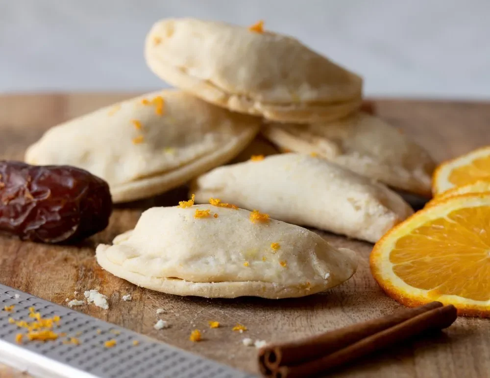 gluten-free date filled cookies with rolled cornmeal dough and date puree