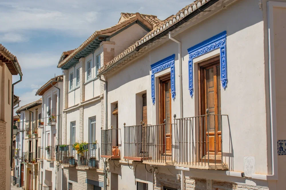winding cobblestone streets through Granada's historic Albaicín neighborhood