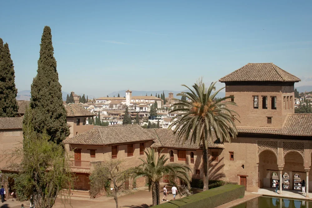 El Partal reflecting pool at Alhambra with Moorish architecture mirrored in water