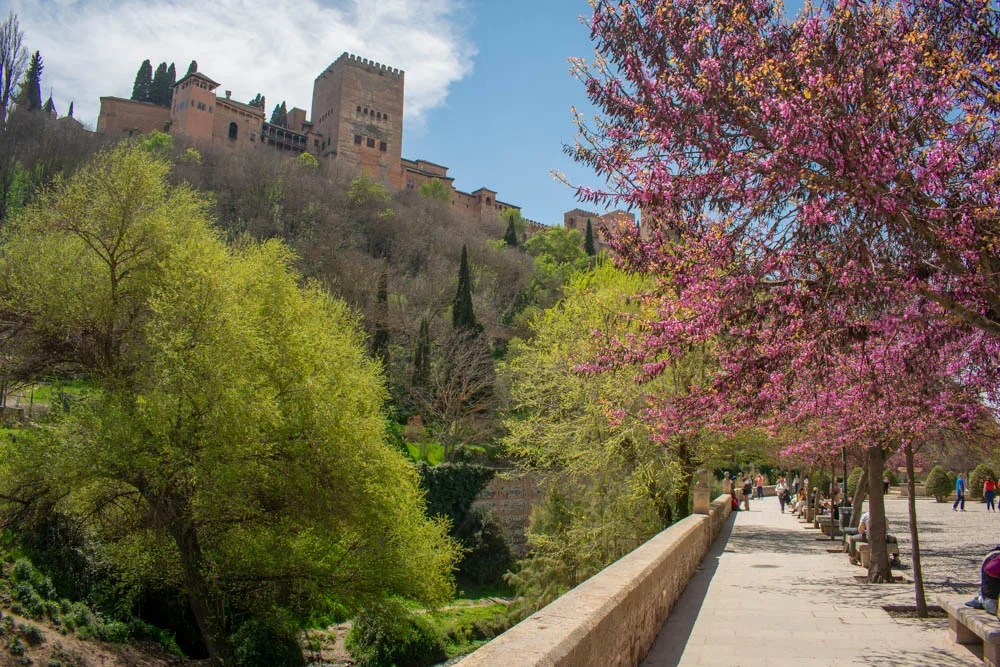 Paseo de los Tristes walkway with Alhambra palace view in Granada