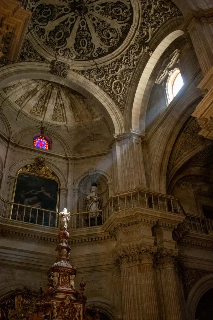 ornate marble tombs of Catholic Monarchs inside Granada's Royal Chapel