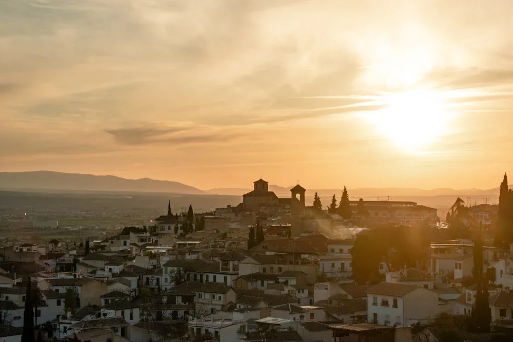 panoramic sunset view over Granada from Ermita San Miguel Alto viewpoint