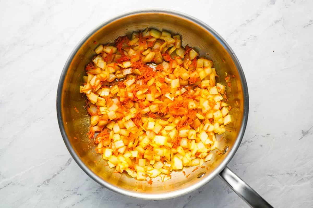 Homemade Spaghetti Sauce Recipe - The Cookie Rookie® 2 onion and carrots sizzling in olive oil for spaghetti sauce base