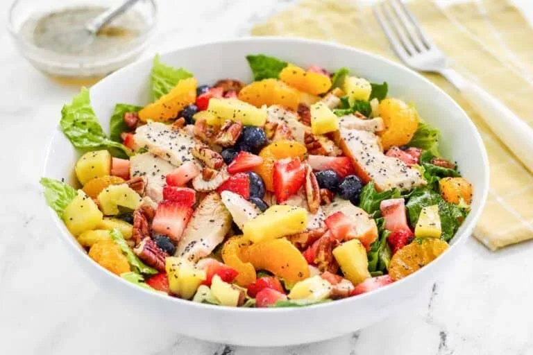 17 Spring Brunch Salads That Feel Fresh 2 fresh spring brunch salad with grilled chicken, strawberries, and poppyseed dressing
