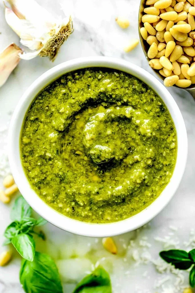 THE BEST Fresh Basil and Pine Nut Pesto - foodiecrush 6 basil pesto ingredients blending in food processor