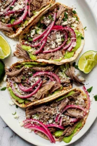 Salsa Verde Shredded Pork Tacos | foodiecrush.com