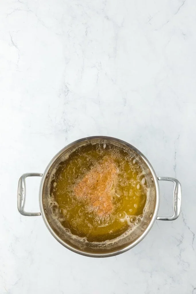 Authentic Mississippi Fried Catfish Recipe That's Crispy & Tender 6 oil thermometer showing perfect 350°F temperature for frying cornmeal