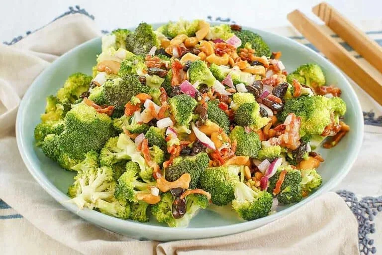 17 Spring Brunch Salads That Feel Fresh 16 broccoli madness salad with bacon and creamy dressing in a white bowl