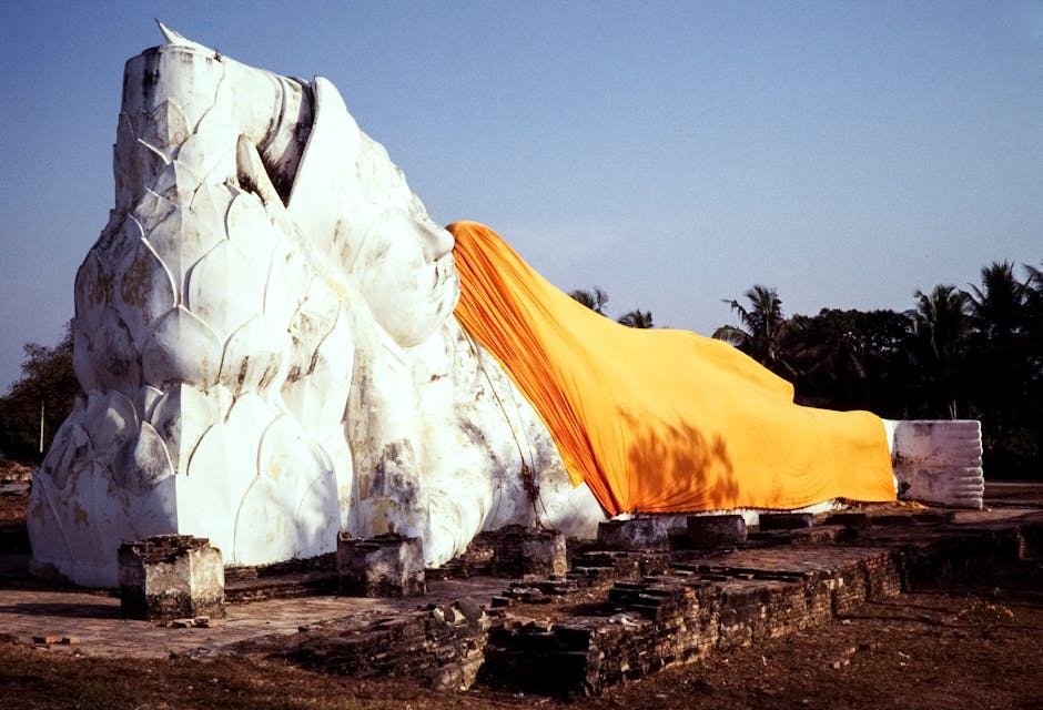 Ayutthaya Travel Guide: History, Food & Hidden Gems 3 Reclining Buddha statue at Wat Lokayasutharam at sunset