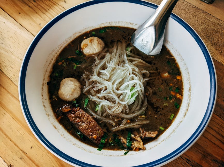 Ayutthaya Travel Guide: History, Food & Hidden Gems 6 Plate of boat noodle soup with herbs and lime