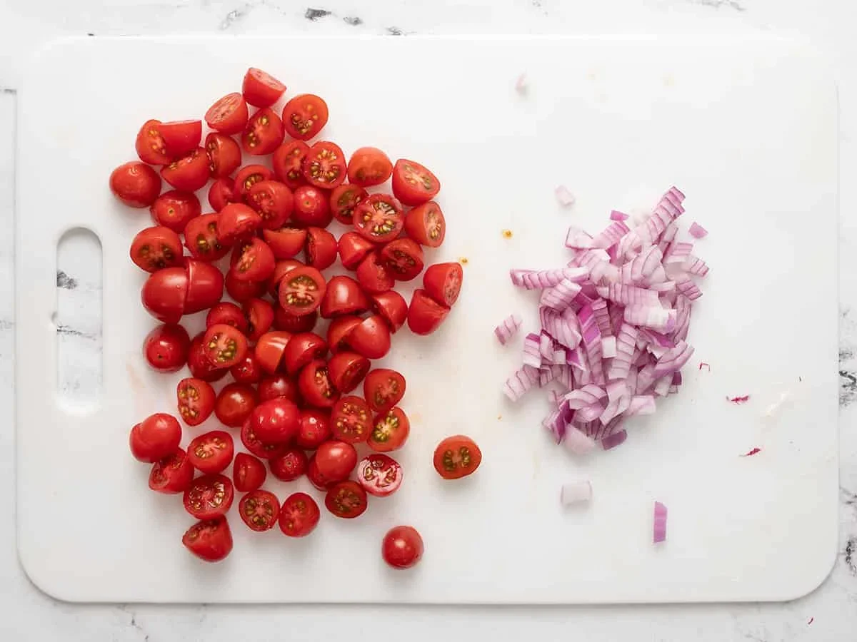 blt pasta salad combines creamy mayo-ranch dressing with crispy bacon, fresh tomatoes, and spinach for the perfect summer side dish. This easy recipe is ideal for BBQs, picnics, and potlucks. Make it now!
