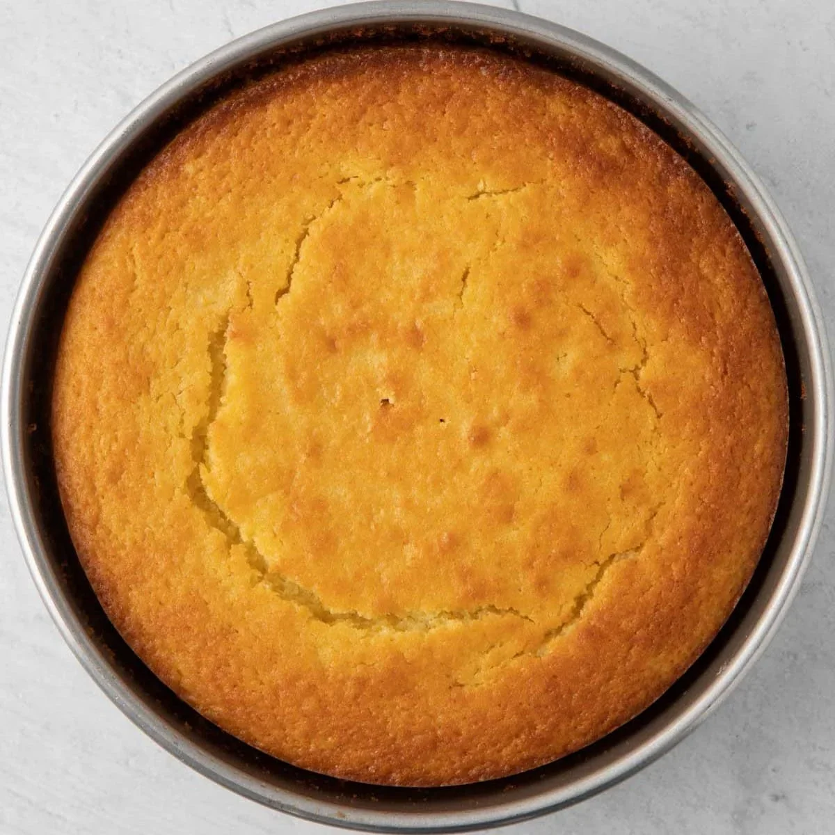 Easy Lemon Ricotta Cake Recipe with One-Bowl Simplicity 7 lemon ricotta cake made with fresh lemon zest, ricotta cheese and olive oil for a soft, moist texture. This one-bowl recipe requires no frosting and is perfect for spring. Try it tonight!