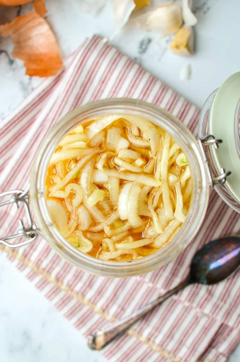 Easy Honey Onion Cough Syrup Recipe That Actually Works 2 raw honey and yellow onion slices used for natural cough syrup