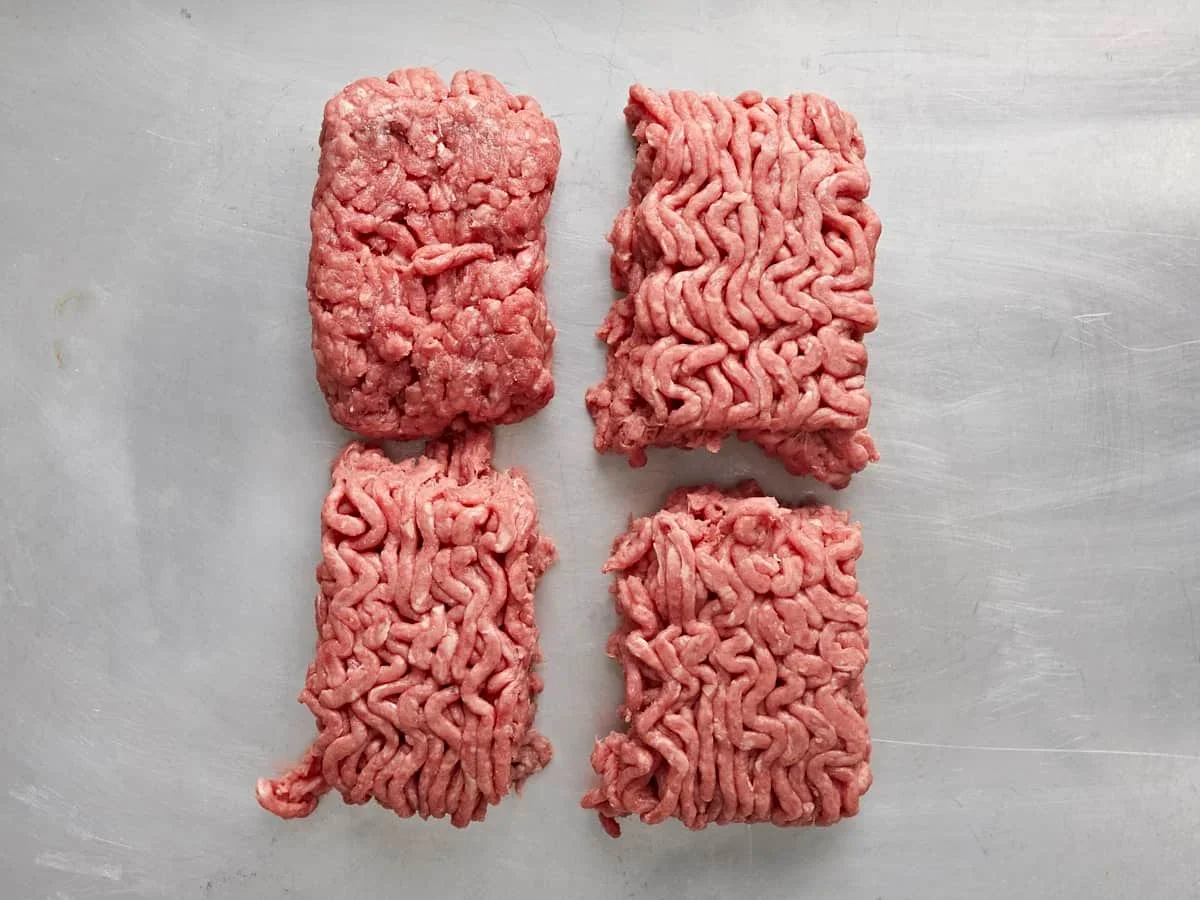 Easy Smash Burger Recipe with Crispy Edges in 30 Minutes 4 four equal portions of ground beef for smash burgers on a scale