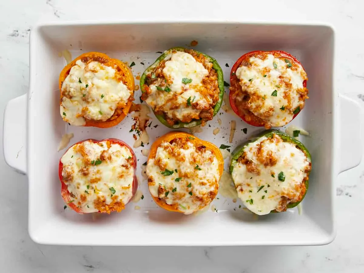 broiled stuffed bell peppers with melted golden mozzarella cheese