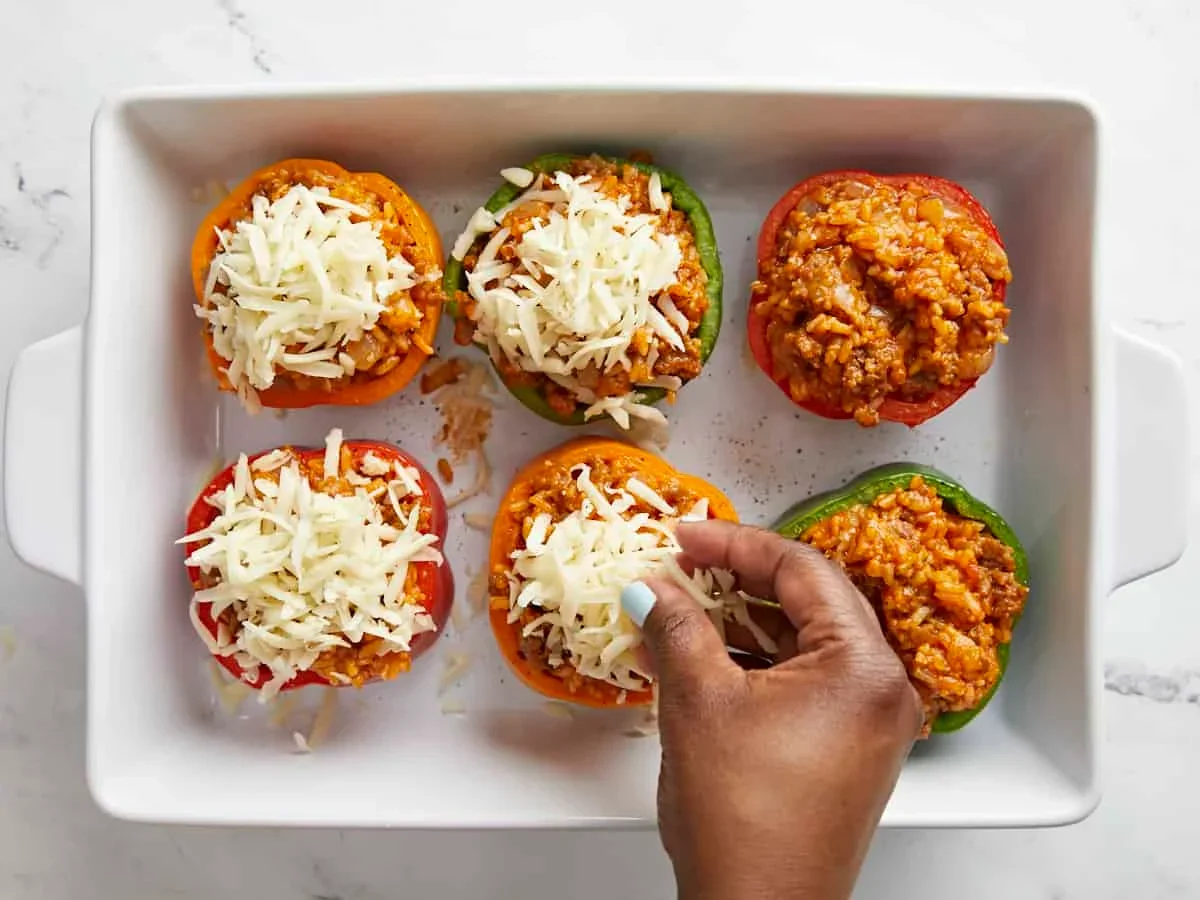 baked stuffed bell peppers with golden melted mozzarella cheese